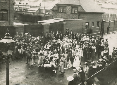 Fancy Dress Parade Leaving the Factory, July 1918 © EMI Group Archive Trust 