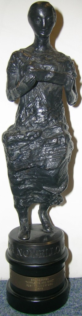 The Ivor Novello Award 1988 presented to EMI for 'Mistletow and Wine' - Courtesy of the EMI Group Archive Trust Collection. 